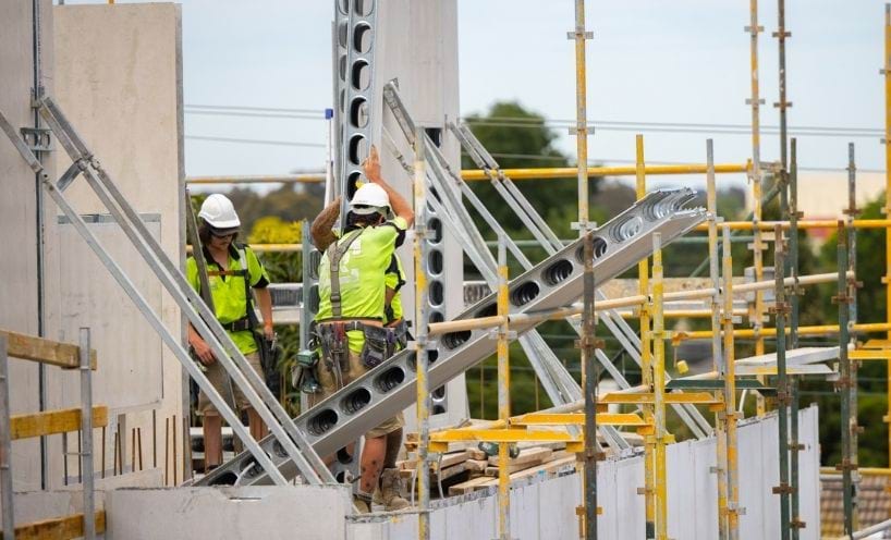 Three tradies on a construction site Three tradies on a construction site